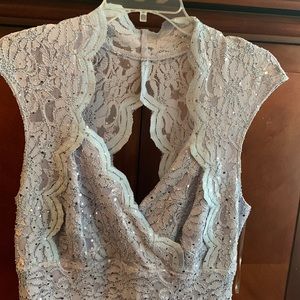 Lavender lace knee length dress.